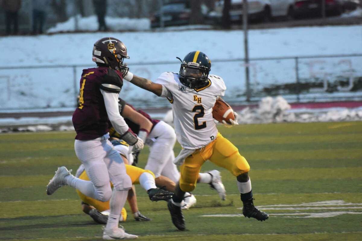 East Haven’s Michael Manning rushes vs. Sheehan at Riccitelli Field on Saturday, November 17, 2018. (Pete Paguaga, Hearst Connecticut Media)