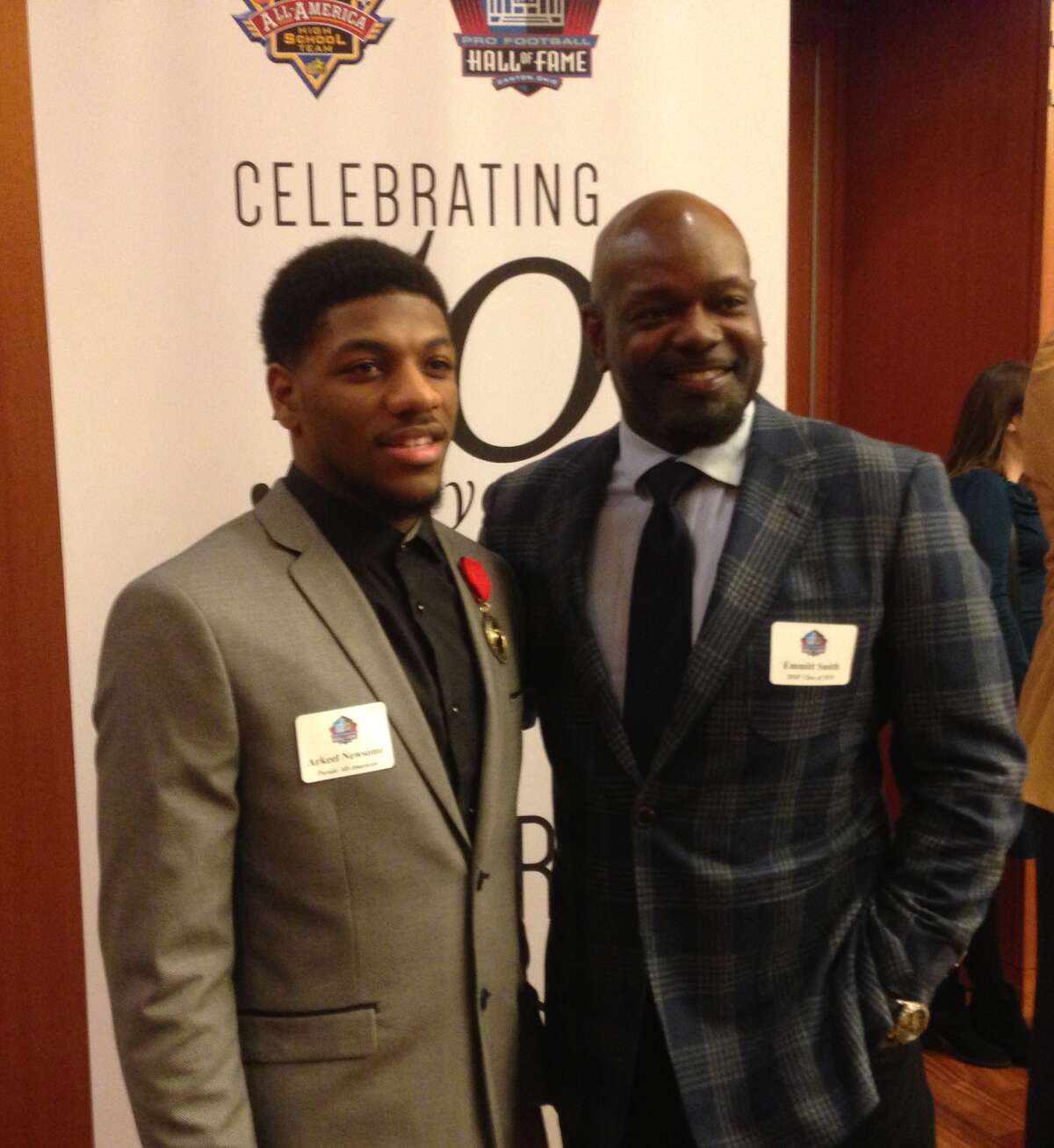 Ansonia’s Arkeel Newsome with Pro Football Hall of Famer Emmett Smith at the Hall of Fame Luncheon New York. Newsome was honored with Will Grier and Jabrill Peppers for their selection to the Parade All-American team. (Photo: Tom Brockett)