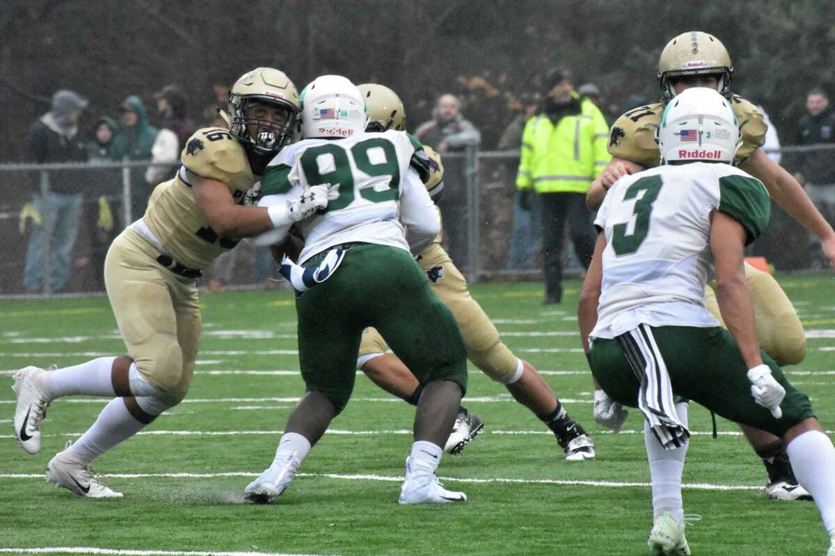 Action in the Class L semifinals game between Maloney and Platt at Falcon Field, Meriden on Sunday, December 2, 2018. (Pete Paguaga, Hearst Connecticut Media)
