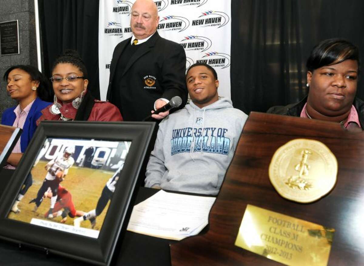Hillhouse running back Harold Cooper signed his national letter of intent to play at Rhode Island in a ceremony held at the Floyd Little Athletic Center Thursday.