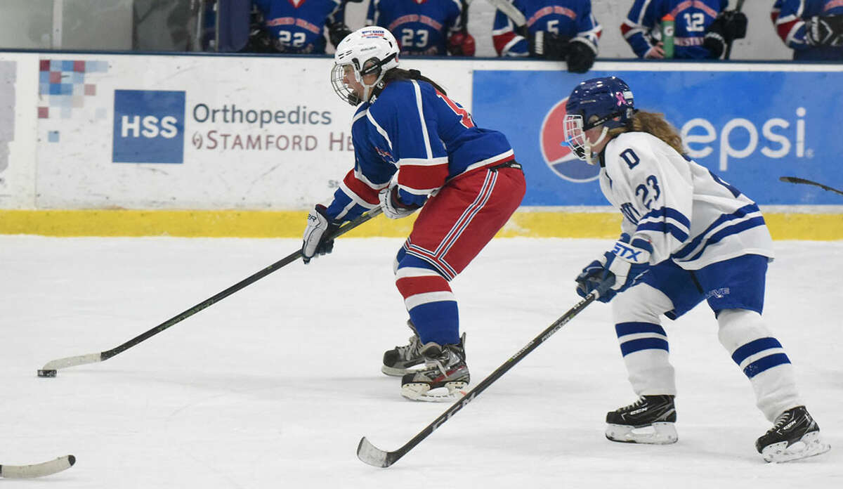 West Haven/SHA’s Brooke McNabola (18) skates to the Darien net.