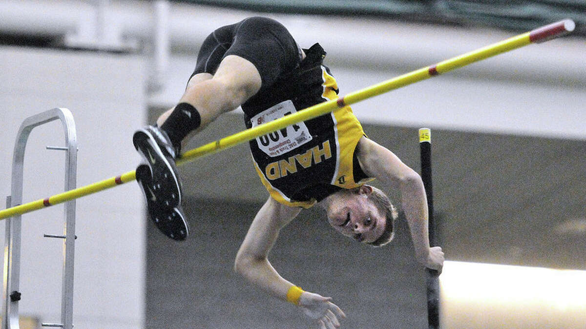 Hand’s Ian Bergere had already won the meet, but just barely missed here as he tries for 14-6 in the pole vault at the Class L State Track Championships. pcasolino@NewHavenRegister