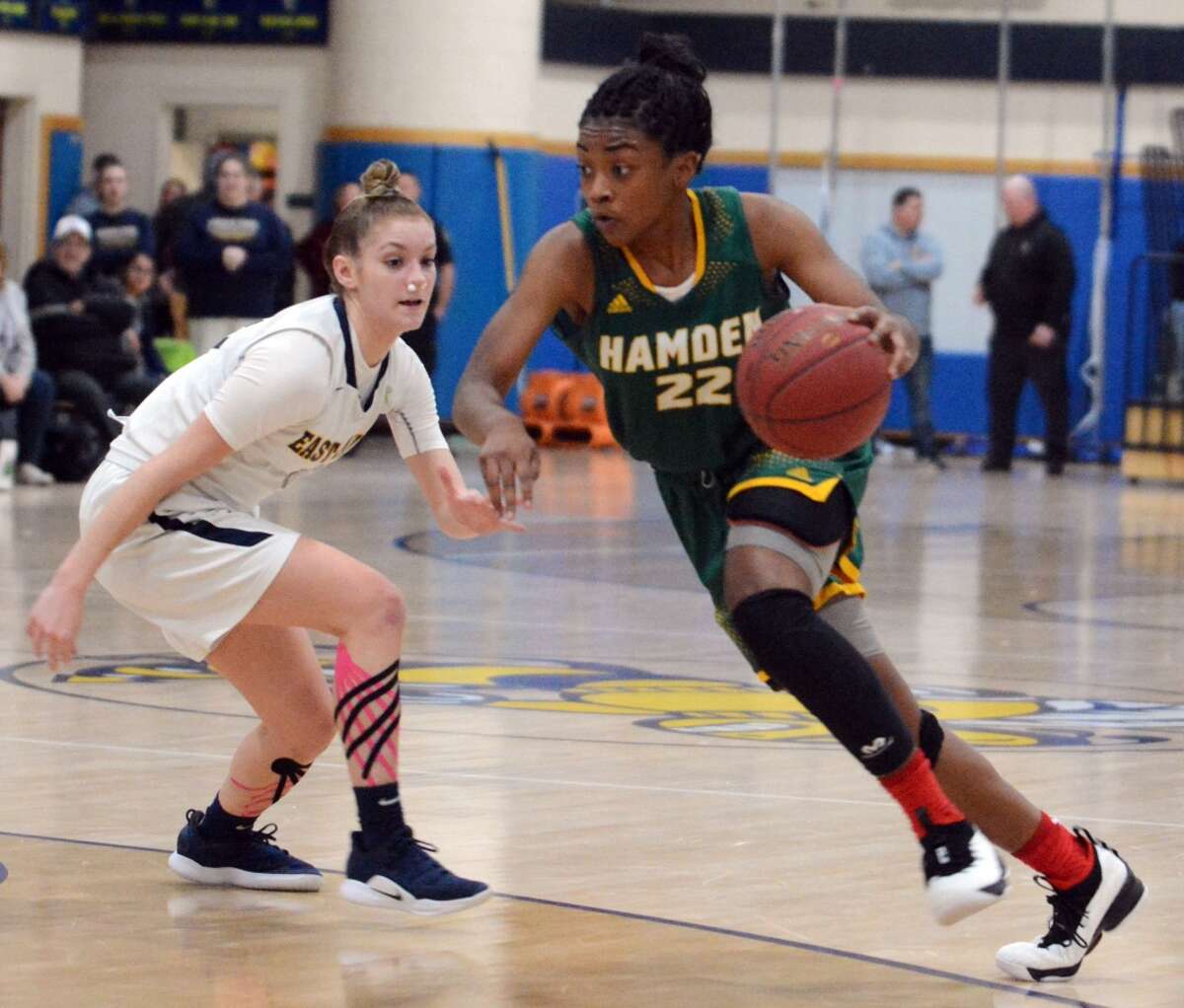 Hamden’s Taniyah Thompson drives past East Haven’s Makenzie Helms during a girls basketball game on Jan. 23, 2019 in East Haven, Conn. East Haven and Hamden are the top two seeds in the SCC Girls Basketball Tournament, which begins Thursday, Feb. 14.