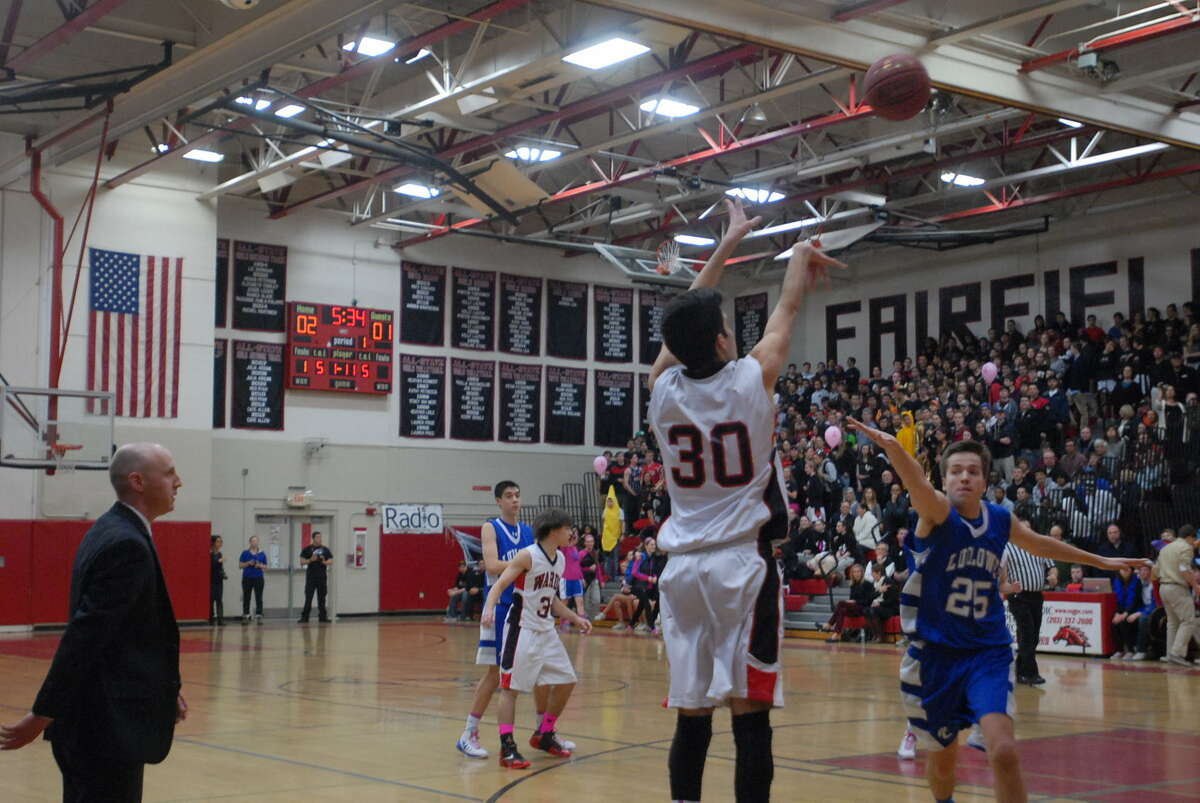 Warde’s Nick Cotto shoots a 3-pointer from the corner in Tuesday’s game against Ludlowe.