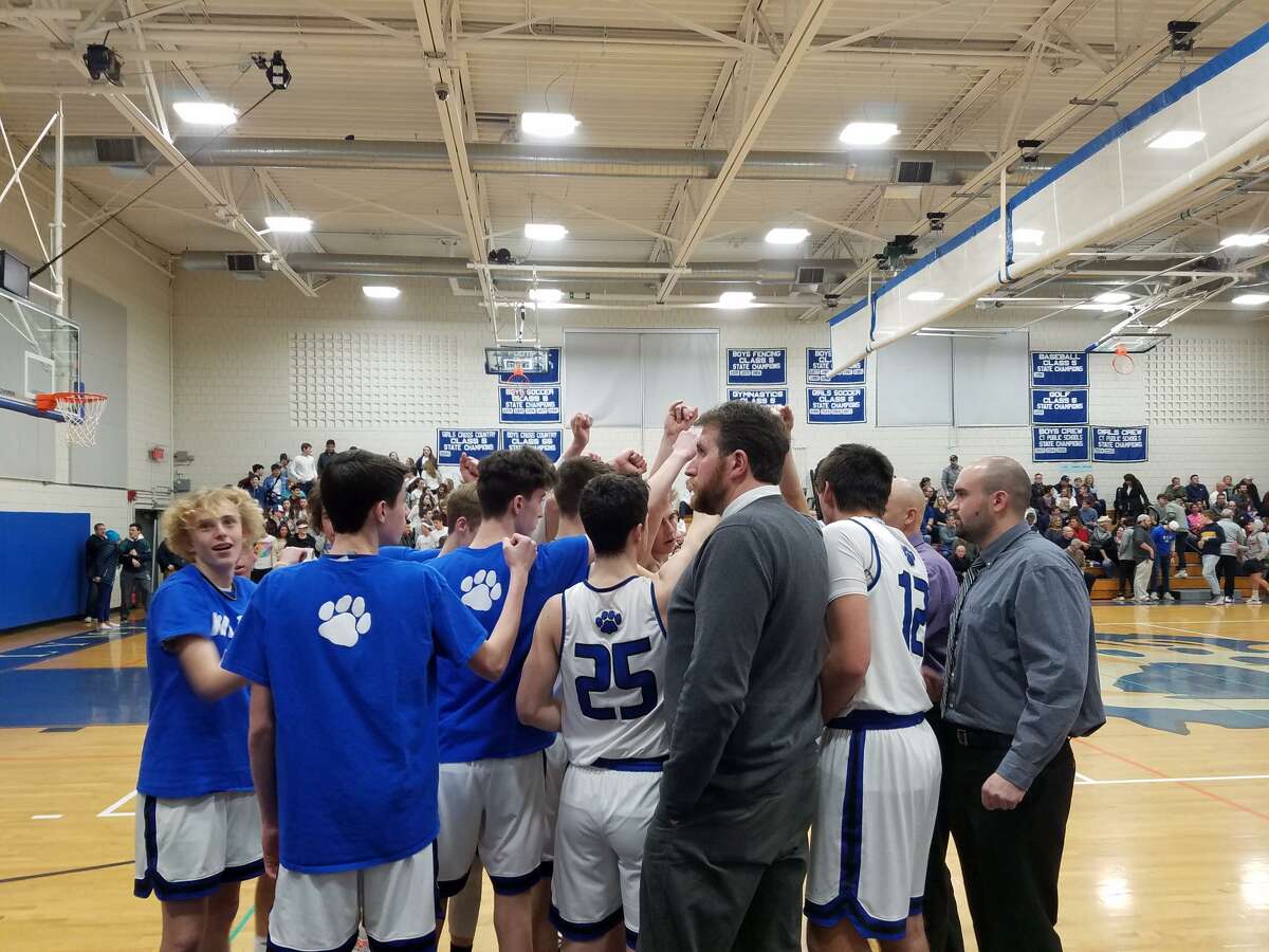 Old Lyme coach Kirk Kaczor addresses his team during Tuesday's Shoreline Conference semifinal victory over Valley Regional.