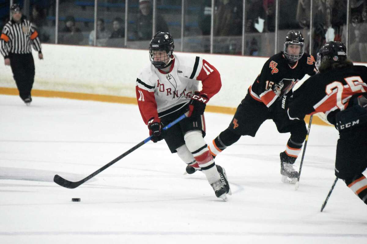 Branford’s Jack Manware skates up the ice in the SCC/SWC Divison III championship game at Bennett Rink, West Haven. (Pete Paguaga, Hearst Connecticut Media)