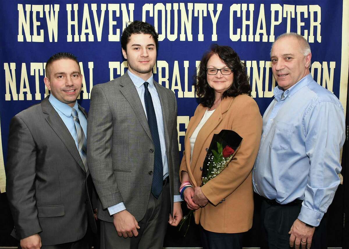 Ansonia Luca Belenchia with parents Dawn and Victor (R) and coach Thomas Brockett.