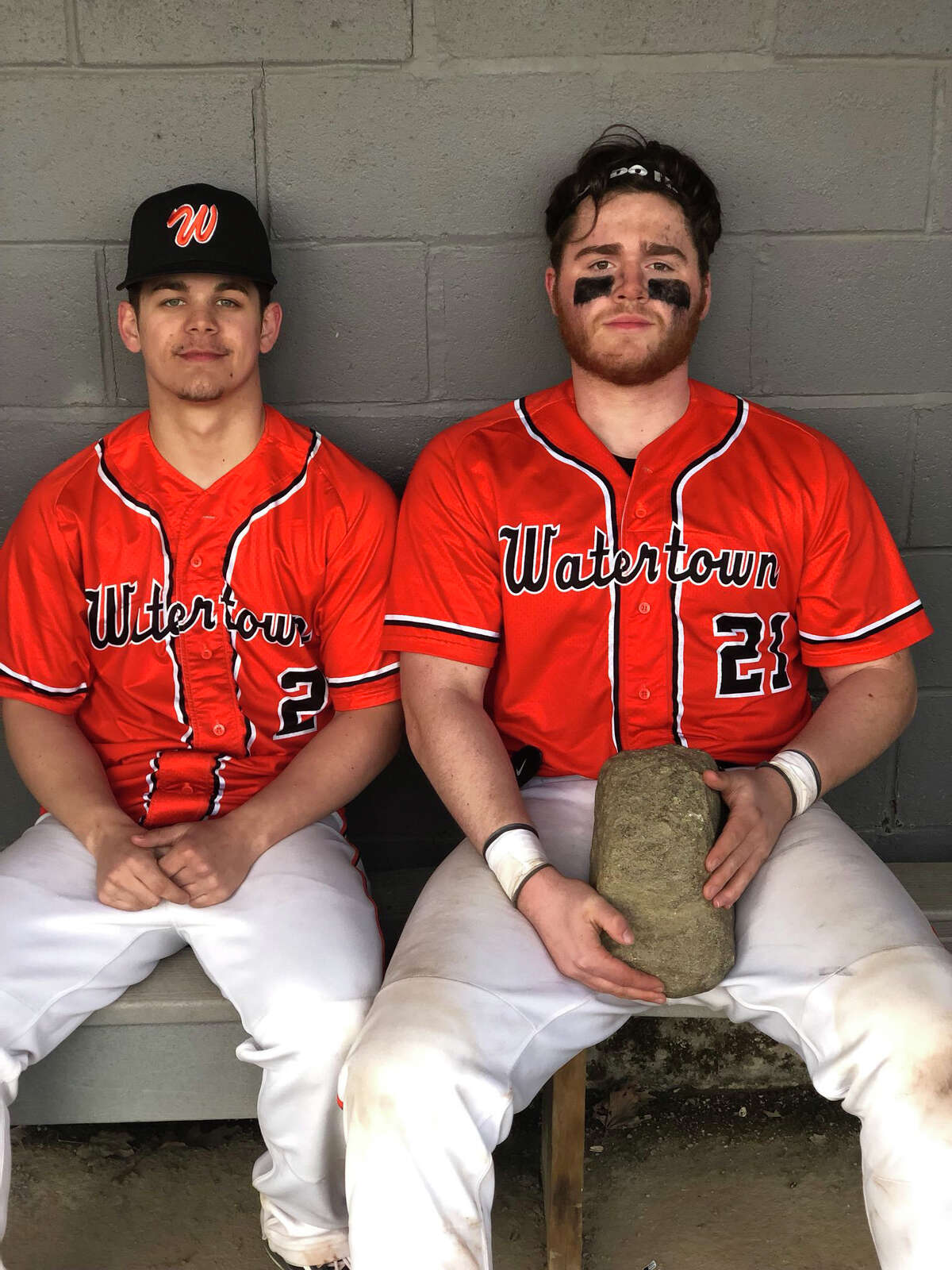 Watertown’s Stevie Phillips, left, and Andrew Teardo were both awarded the rock after the team’s win over Pomperaug. (Photo courtesy of @WatertownHSBase on Twitter)