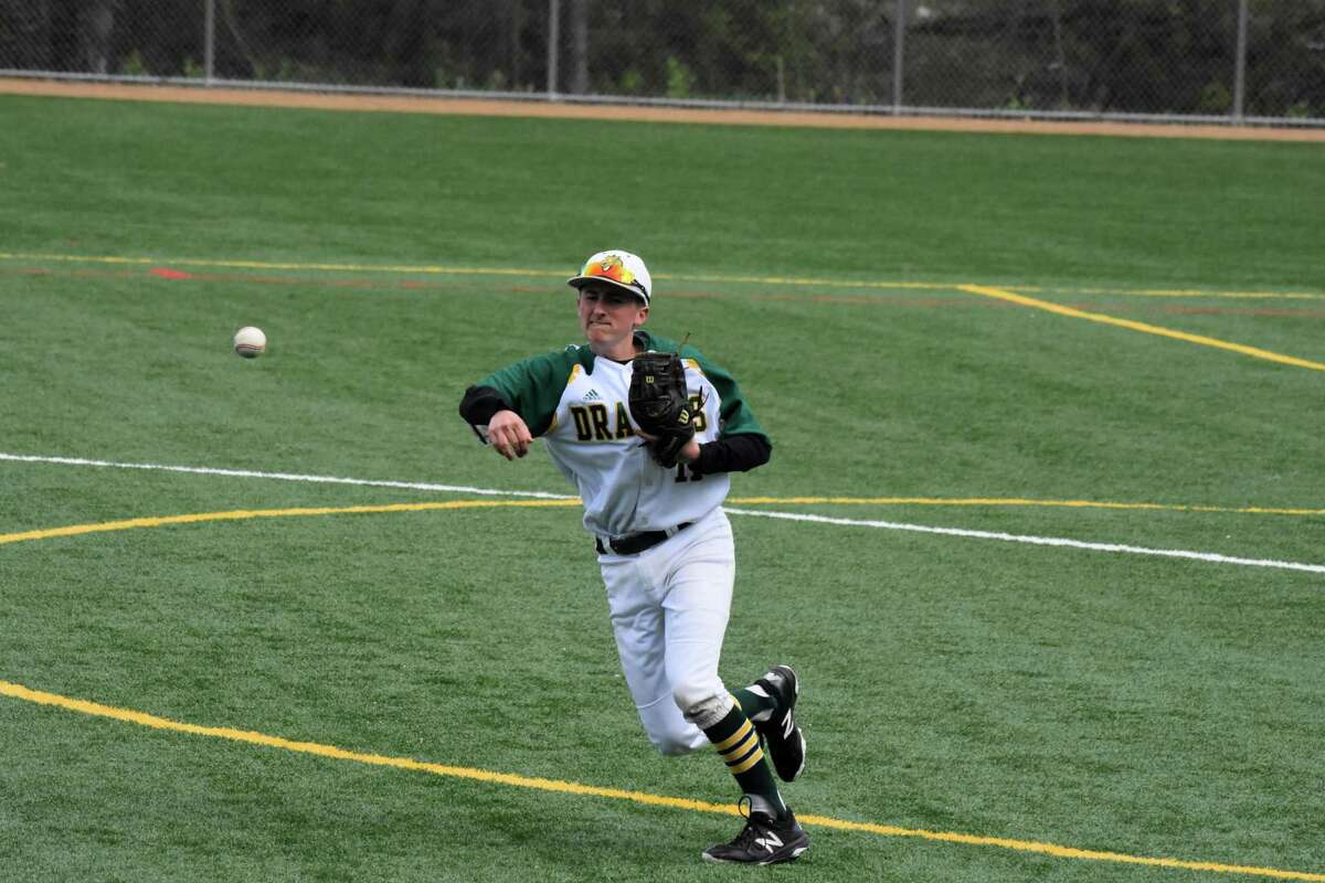 Action between Hamden and East Catholic at Hamden high school on Saturday, April 27, 2019. (Pete Paguaga, Hearst Connecticut Media)