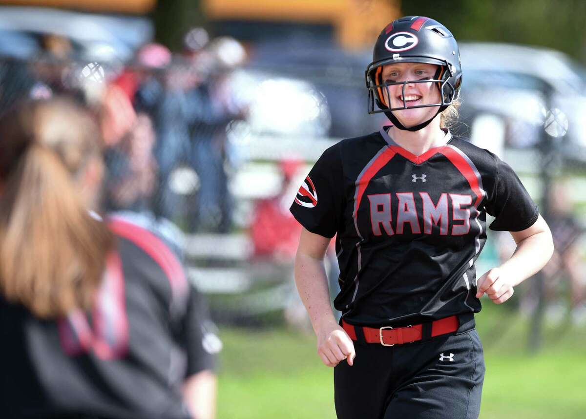 Mia Juodaitis of Cheshire heads to home plate after hitting a home run in the first inning against Amity in Cheshire on May 7, 2019.