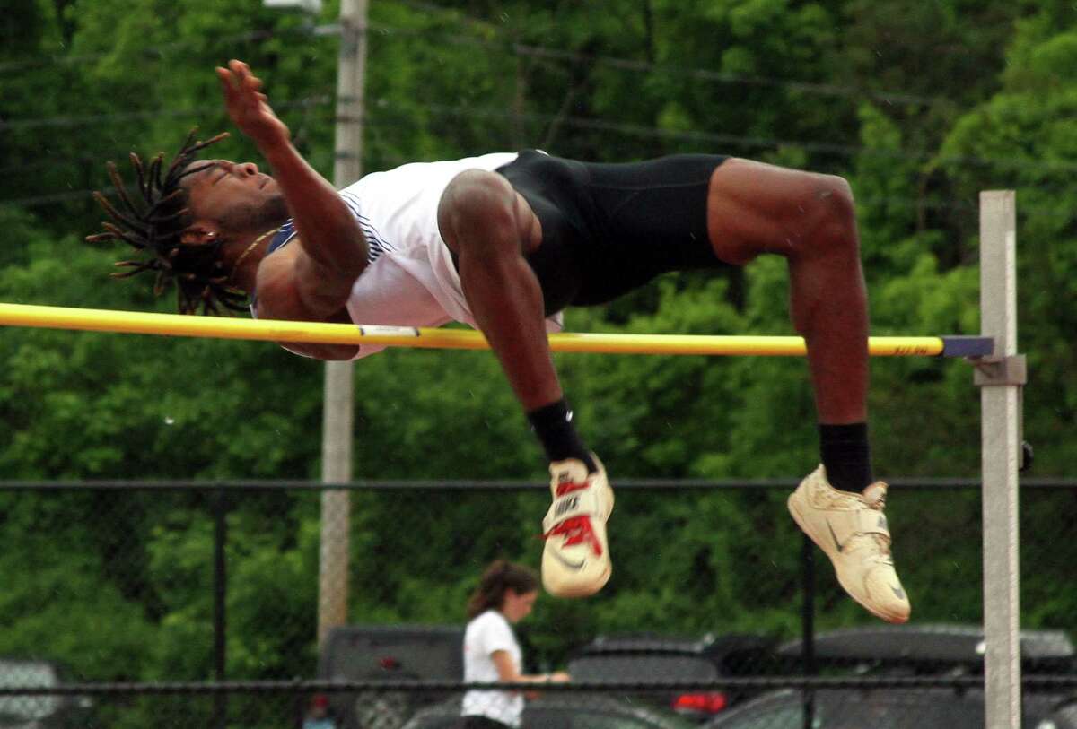 Brien McMahon's Justin Forde competes in the boys high jump during Class LL Track and Field Championship action in New Britain, Conn., on Wednesday May 29, 2019.