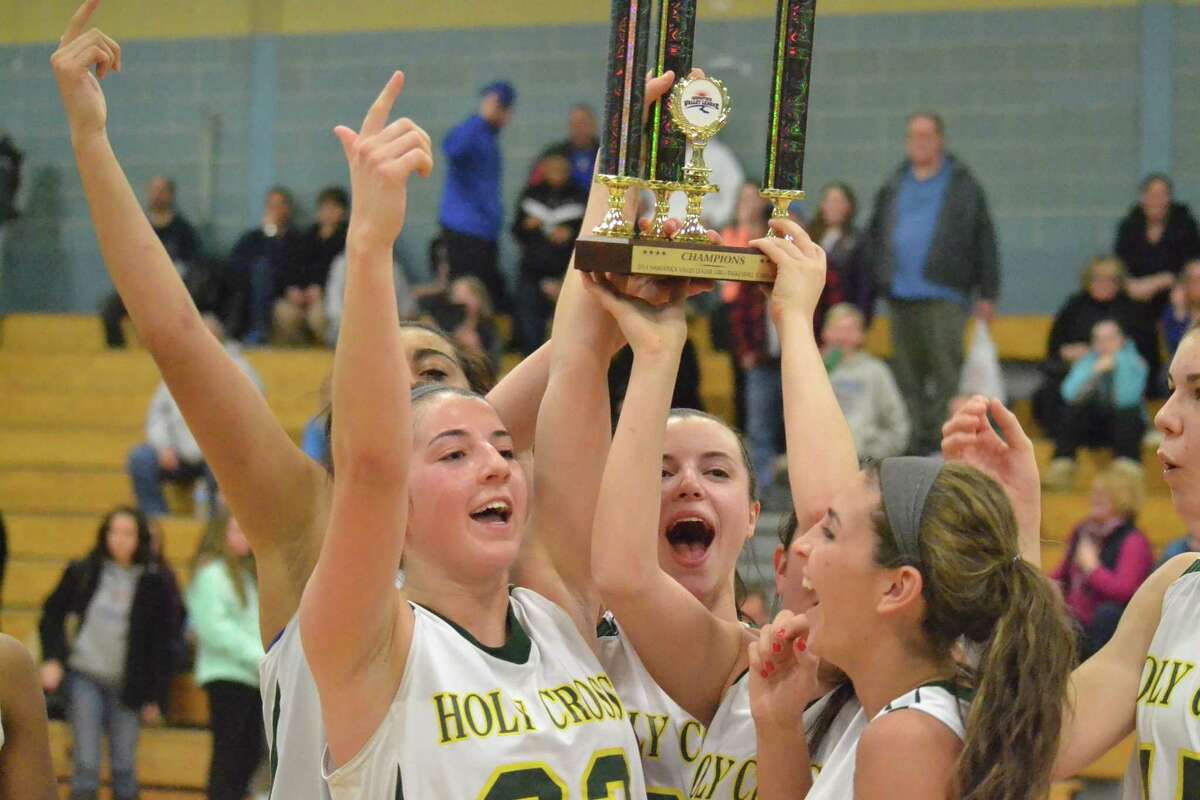 The Holy Cross Crusaders won the NVL tournament title with a 48-38 win over St. Paul.