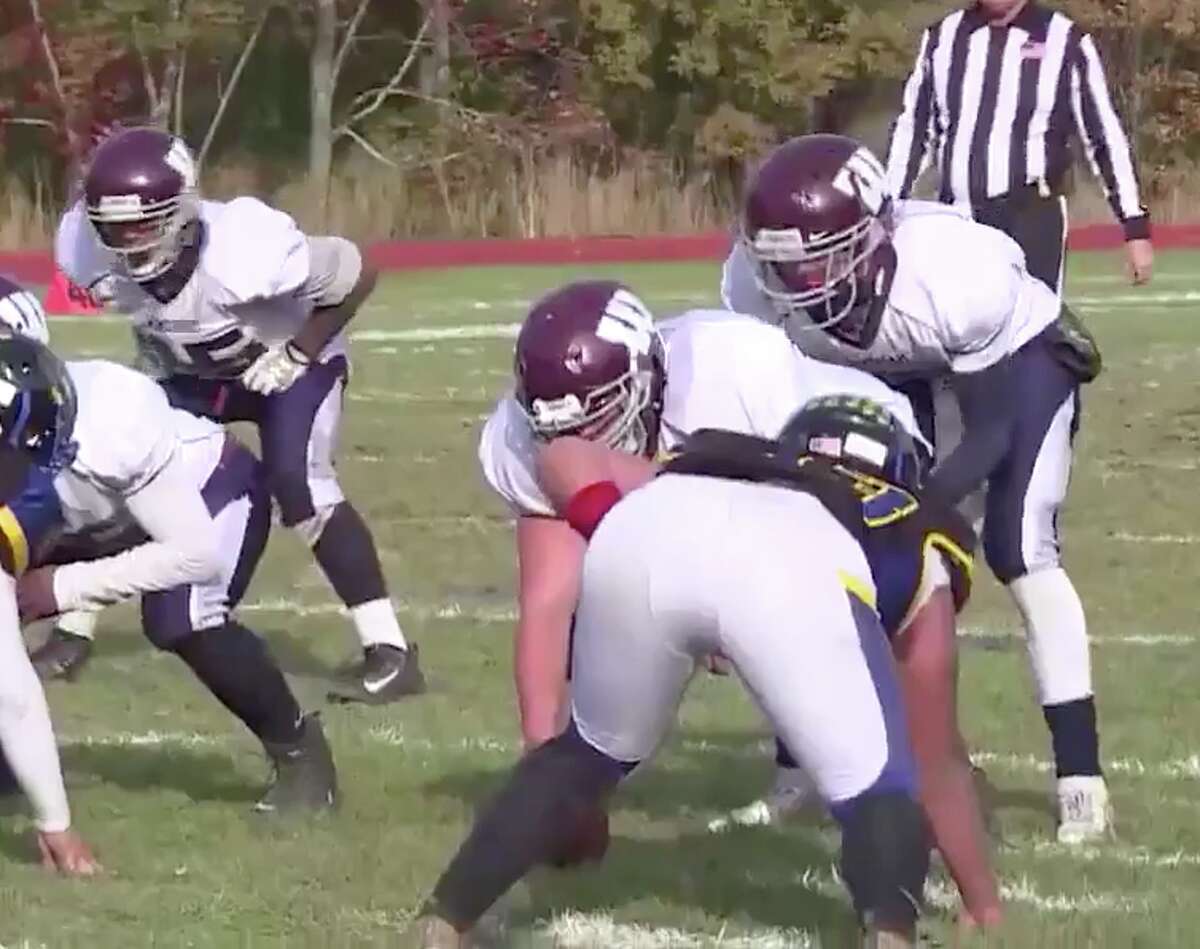 Windham three-year starter Jovan Almodovar lines up under center during a game vs. Bacon Academy last season (Screenshot / CT Sports Now)