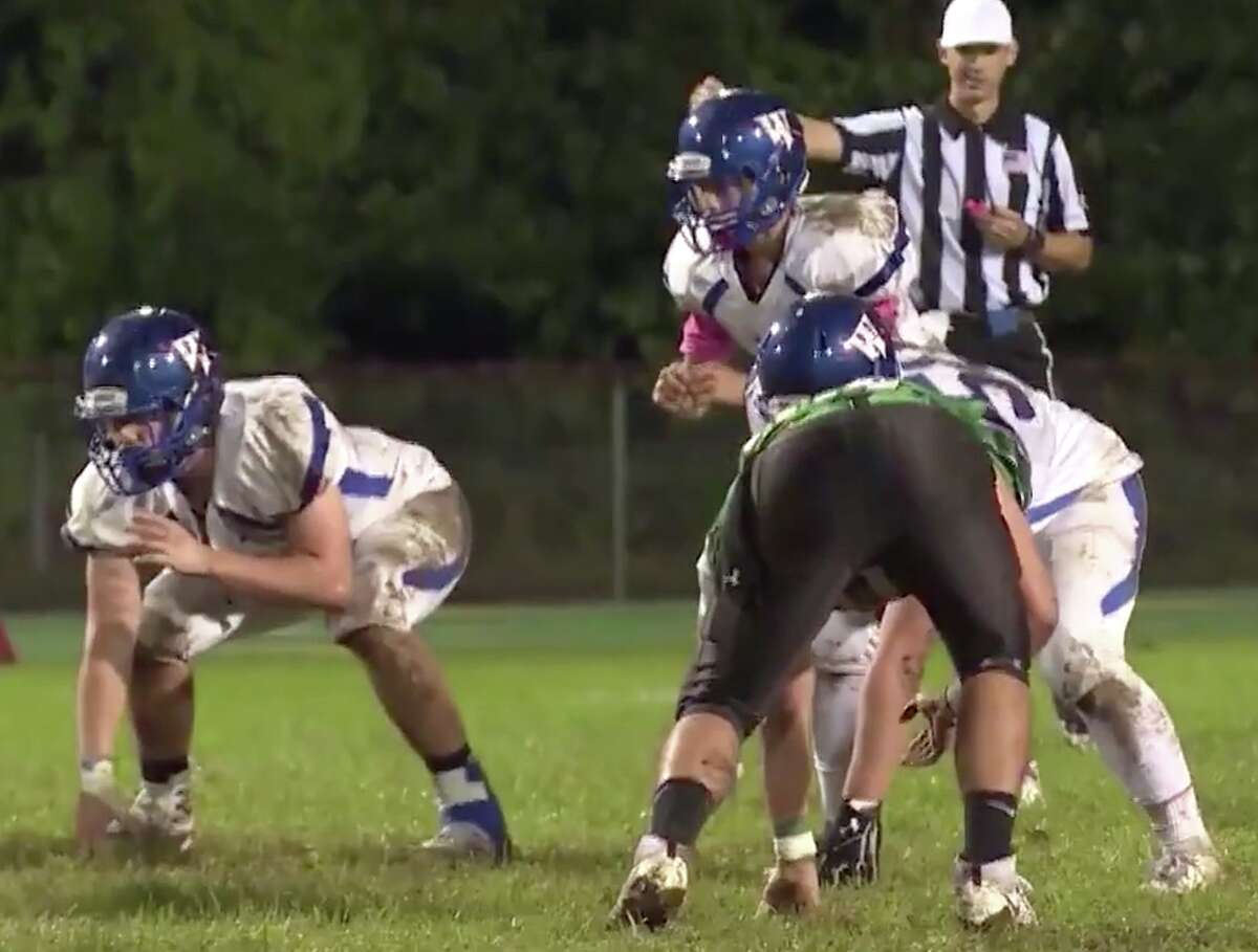 Waterford’s Ryan Bakken (behind center) returns at quarterback for the Lancers in 2019. (Screenshot / CT Sports Now)