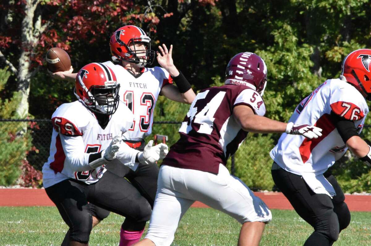 Saturday’s football roundup: Nurse tosses 2 TDs to lead Killingly by Fitch