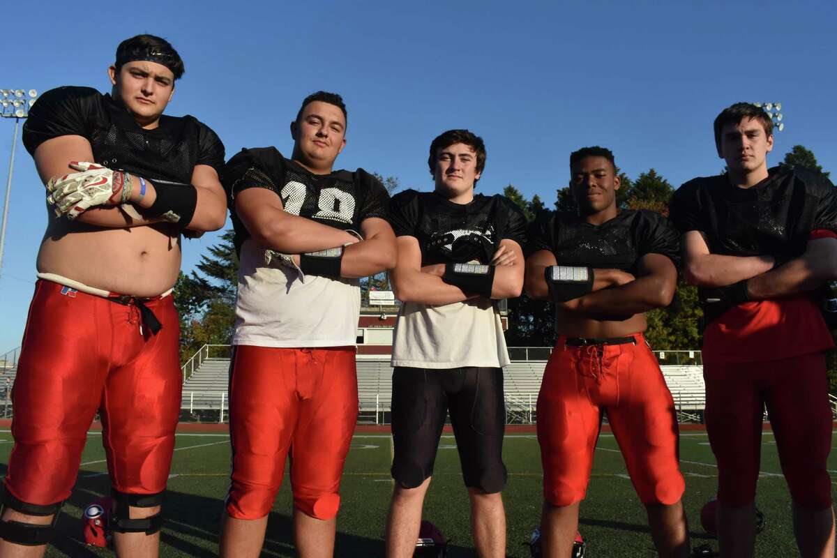 The Cheshire offensive line of Will Bergin, Sean Cangiano, Dan Bourdeau, Chisolm Okoro and Collin Crowe have paved the way for the Rams running game this season. (Pete Paguaga, Hearst Connecticut Media)