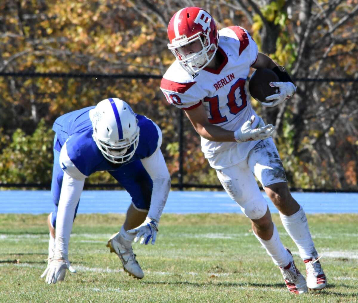 Berlin’s Joseph Caracoglia turns up field in the football game between Berlin and Lewis Mills at Lewis Mills high in Burlington on Oct. 19, 2019. (Pete Paguaga, Hearst Connecticut Media)