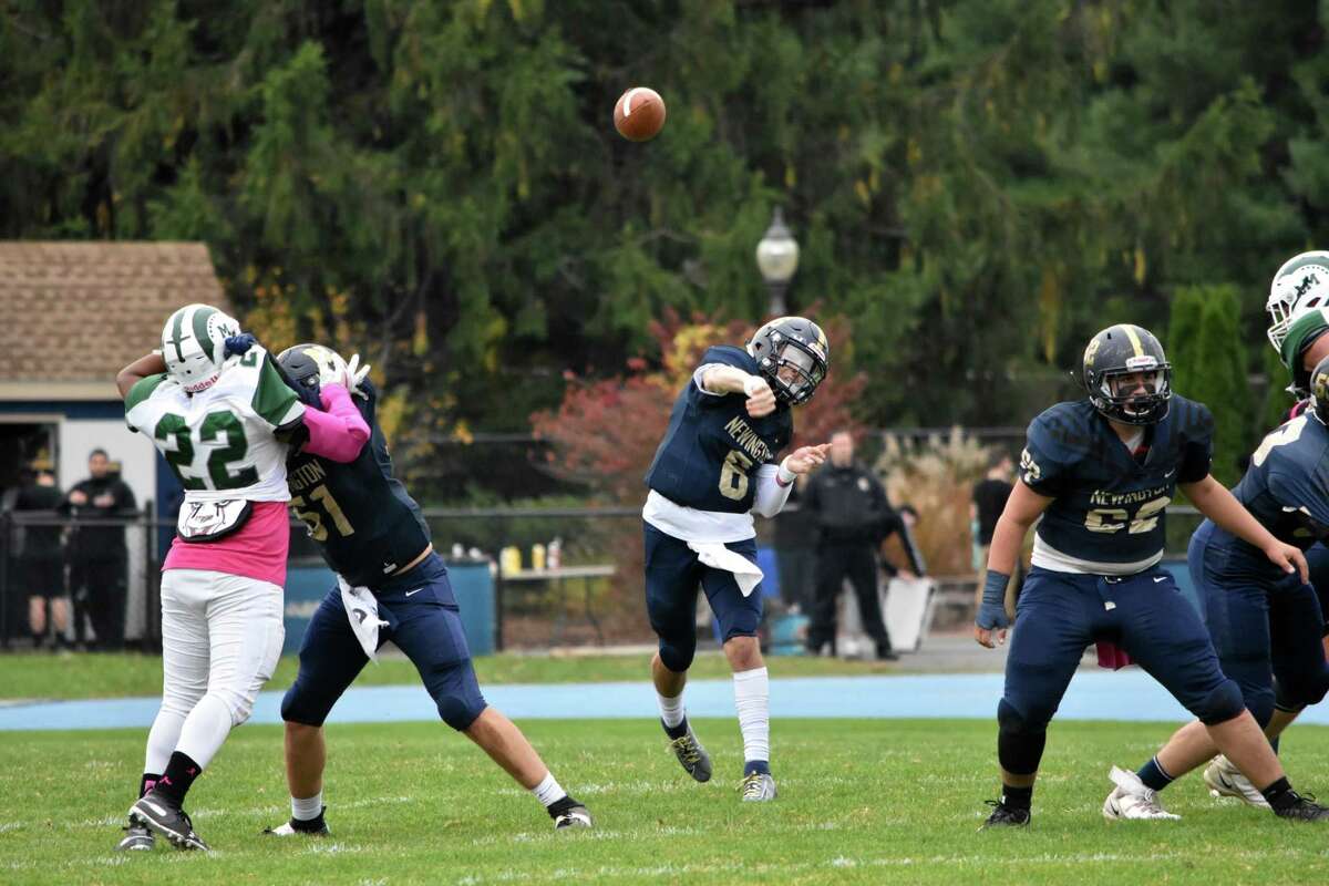 Newington quarterback Nick Pestrichello throws the ball in the football game between Maloney and Newington at Newington high on Friday, Oct. 25, 2019. (Pete Paguaga, Hearst Connecticut Media)