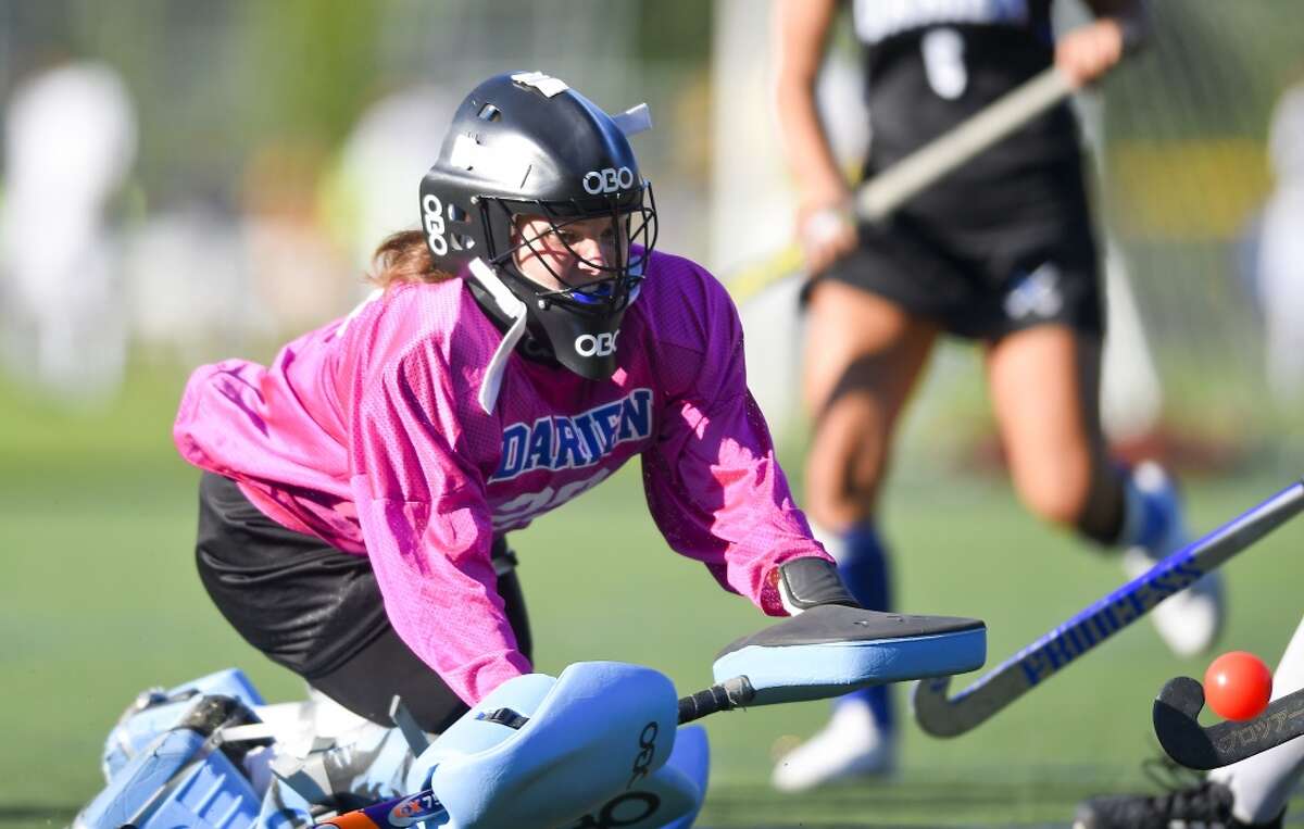 Darien goalie Catherine Vogt (29) makes a save at the goal against Staples in an FCIAC girls field hockey game at Staples High School on Sept. 18, 2019 in Westport, Connecticut. Darien defeated Staples 3-1.