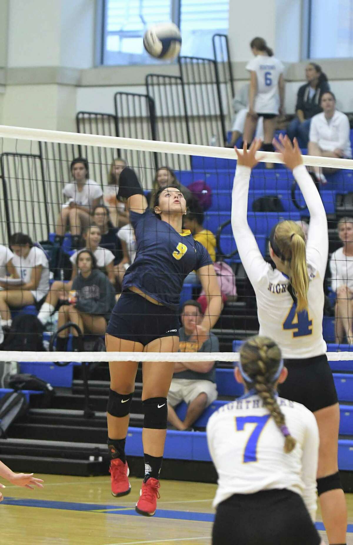 Woodstock Academy’s Paula Hernandez (9) during the Woodstock Academy at Newtown High School girls volleyball game, Sept. 17, 2018.