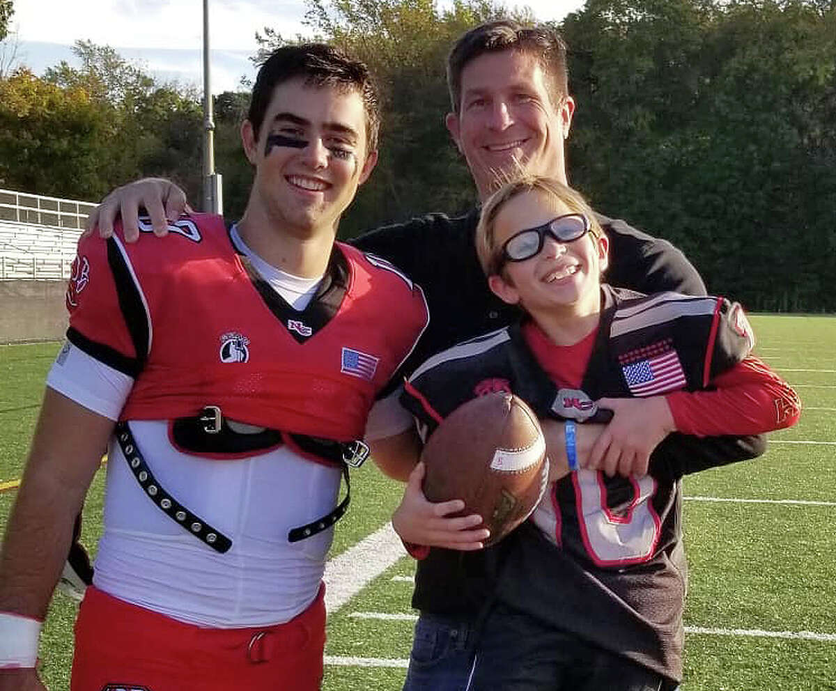 Drew Pyne with Ian and Ryan Berg at Dunning Field for the Rams’ homecoming football game at Dunning Field on Saturday, Oct. 26, 2019.