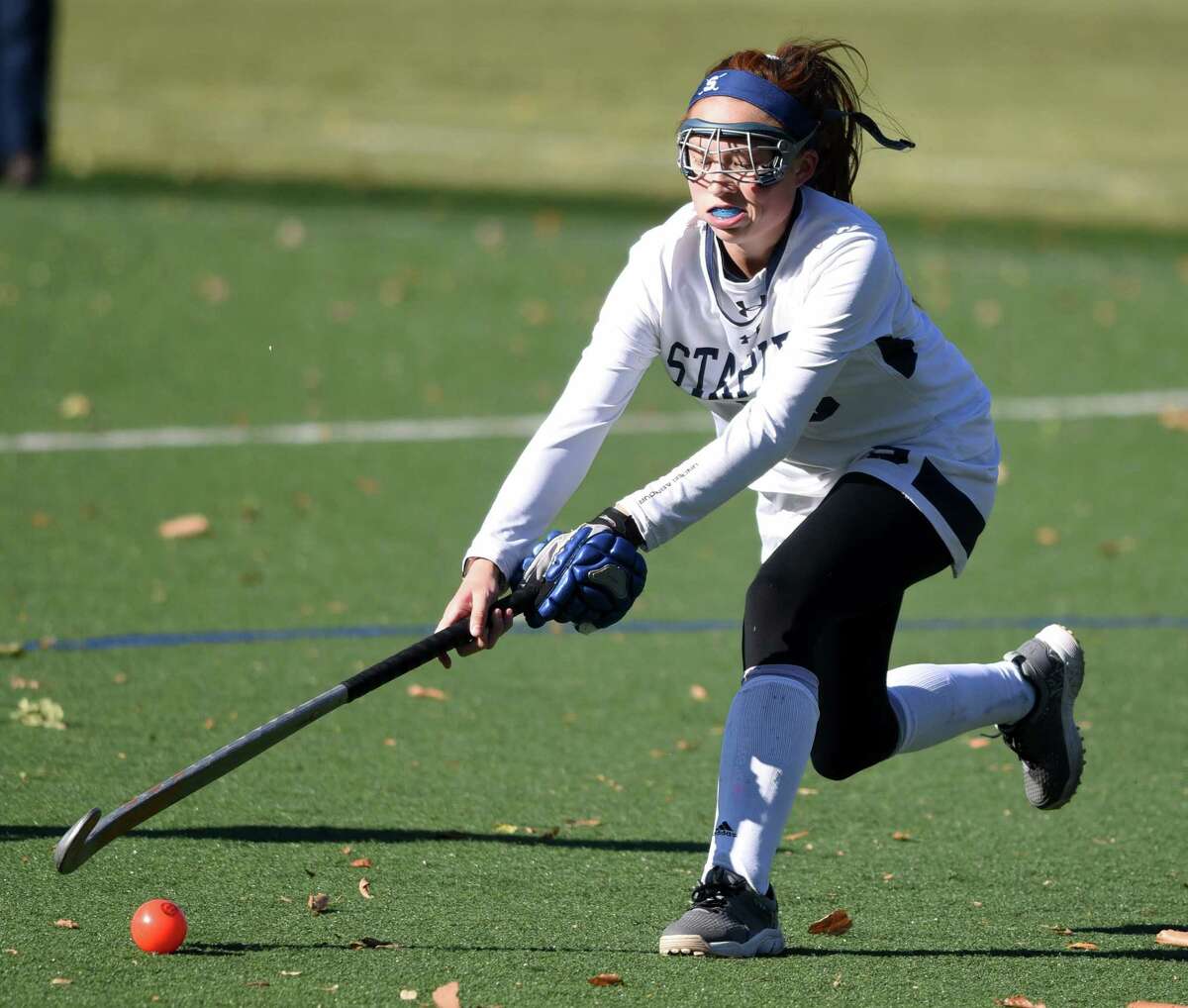 Staples' Laine Ambrose (10) corrals the ball during the Wreckers' game against New Canaan in the CIAC Class L field hockey quarterfinals in Westport on Saturday, Nov. 16, 2019.