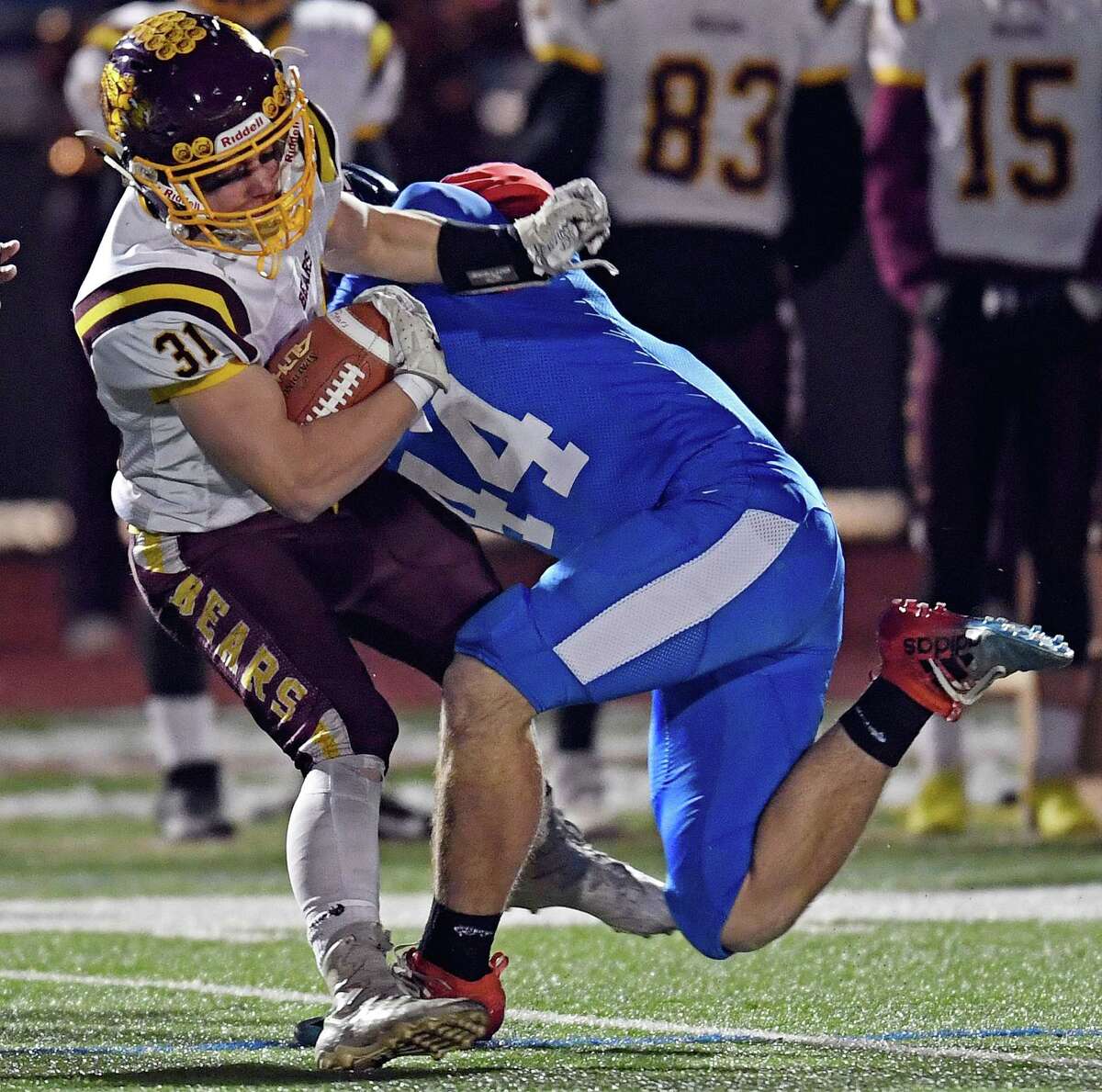 12/4/19 :: SPORTS :: DIMAURO :: Waterford's Jackson Harshberger (44) tackles Granby/Canton's Sam Schock (31) in CIAC Class M football quarterfinal action Wednesday, December 4, 2019. (Sean D. Elliot/The Day)
