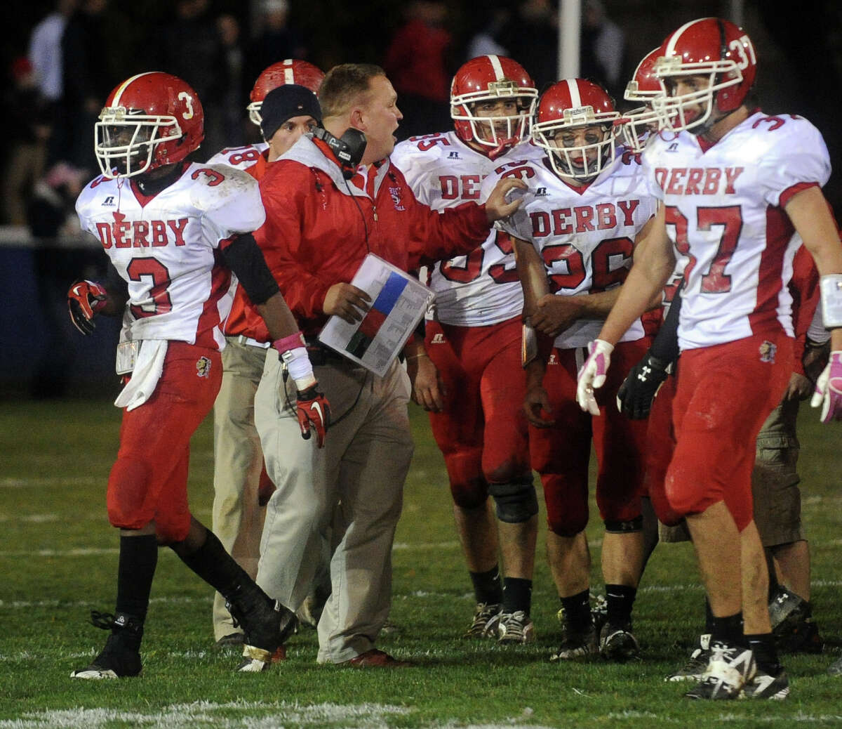Derby coach George French talks to his team during Friday's game at Jarvis Field in Ansonia on October 29, 2010.
