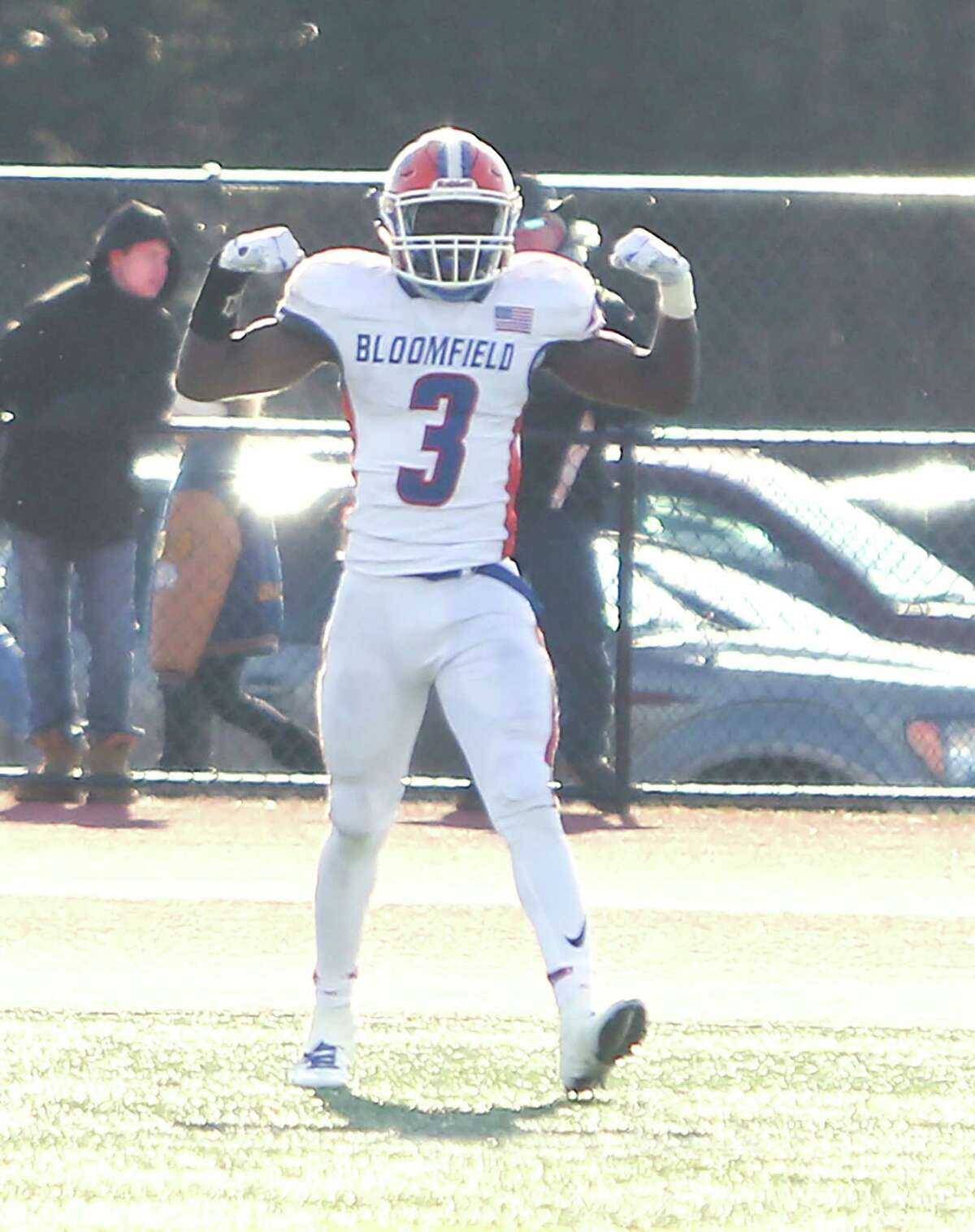 Bloomfield High School’s Anthony Simpson celebrates a touchdown in the end zone during the Class S Championship Game in New Britain against Haddam-Killingworth High School on Saturday, Dec. 8, 2018.