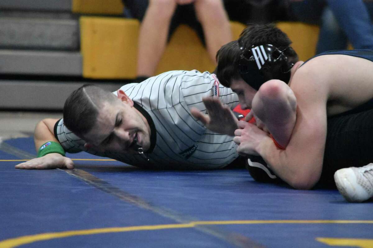 East Haven’s Dylan Tavares pins Shelton’s Mason Stutheit at East Haven High on Tuesday, Jan. 12, 2020. (Pete Paguaga, Hearst Connecticut Media)