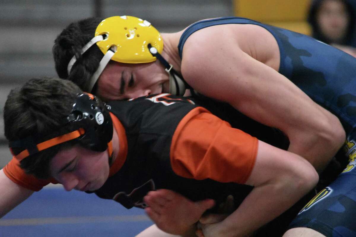 East Haven’s Mat DiVito wrestles Shelton’s Garrett Ziperstein at East Haven High on Tuesday, Jan. 12, 2020. (Pete Paguaga, Hearst Connecticut Media)