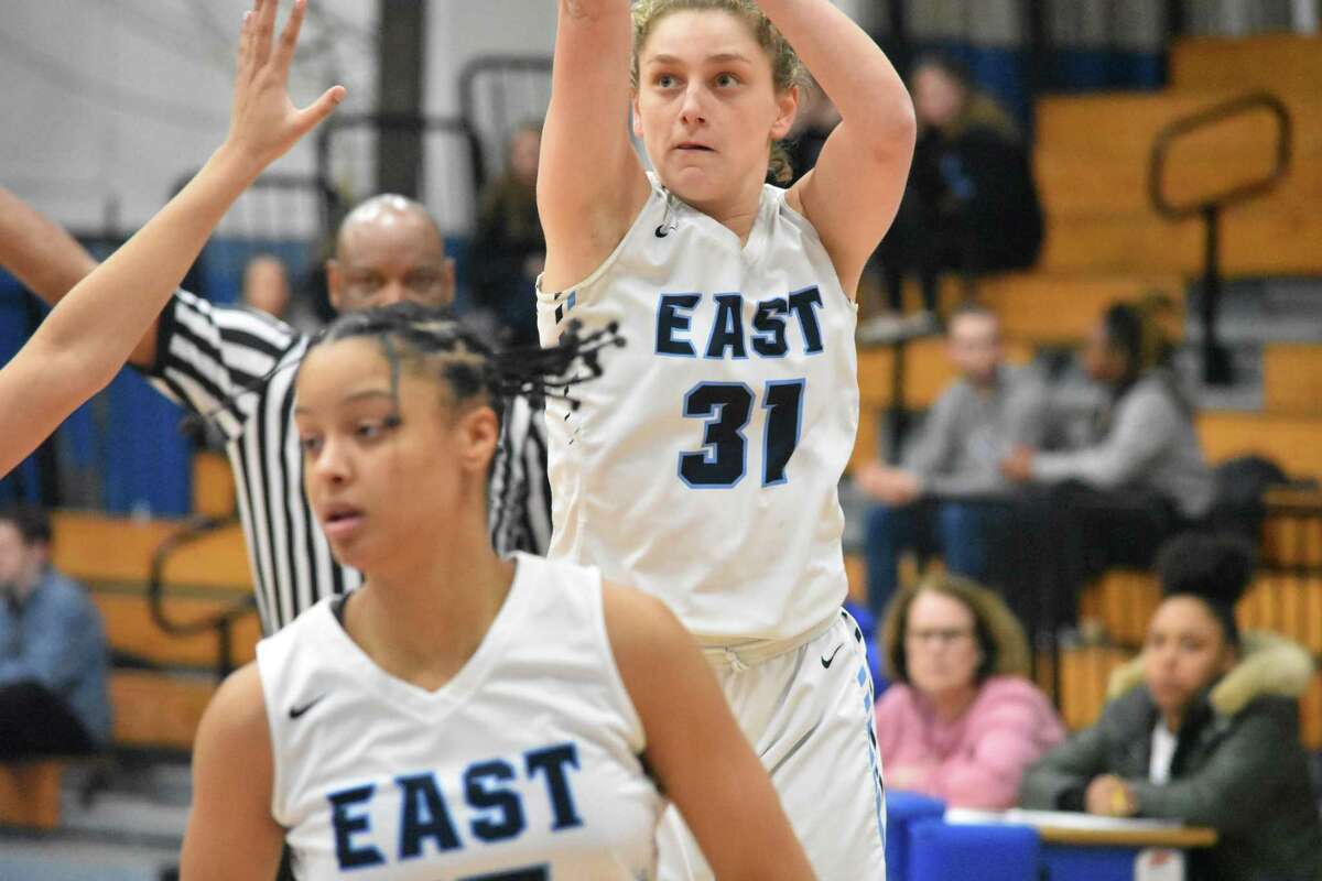 East Catholic’s Cami Pasqualoni takes a shot during the CCC tournament semifinals at Glastonbury high school on Tuesday, February 25, 2020. (Pete Paguaga, Hearst Connecticut Media)