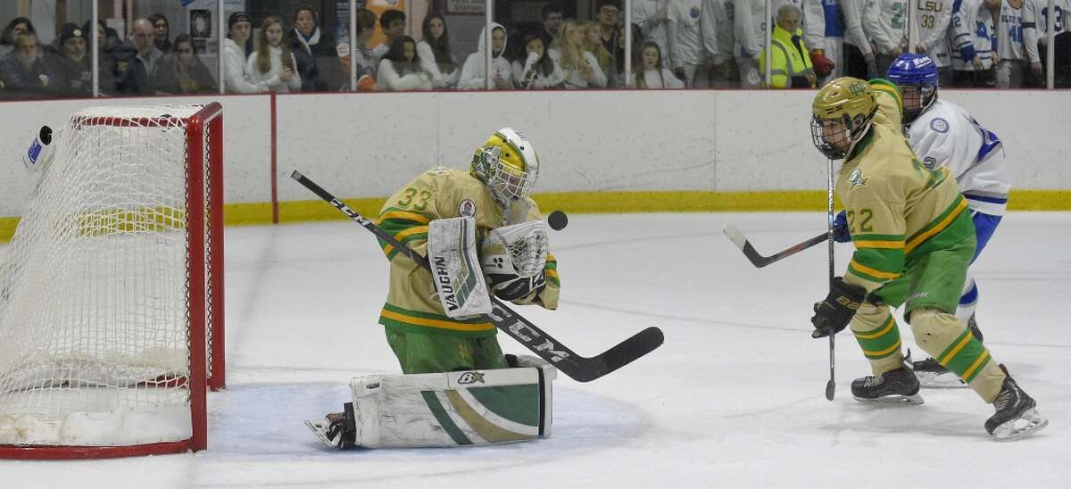 Notre Dame-West Haven goalie Connor Smith makes a save on goal against Darien in the second period of a CIAC boys hockey match up at the Darien Ice House in Darien, Conn. on Jan. 11, 2020. Darien won 5-2.