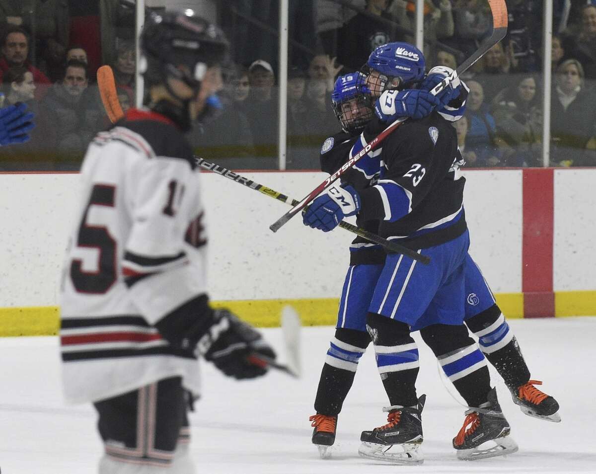 Darien defeated New Canaan 10-2 in an FCIAC boys hockey game at the Darien Ice House on Feb. 8, 2020 in Darien, Connecticut.