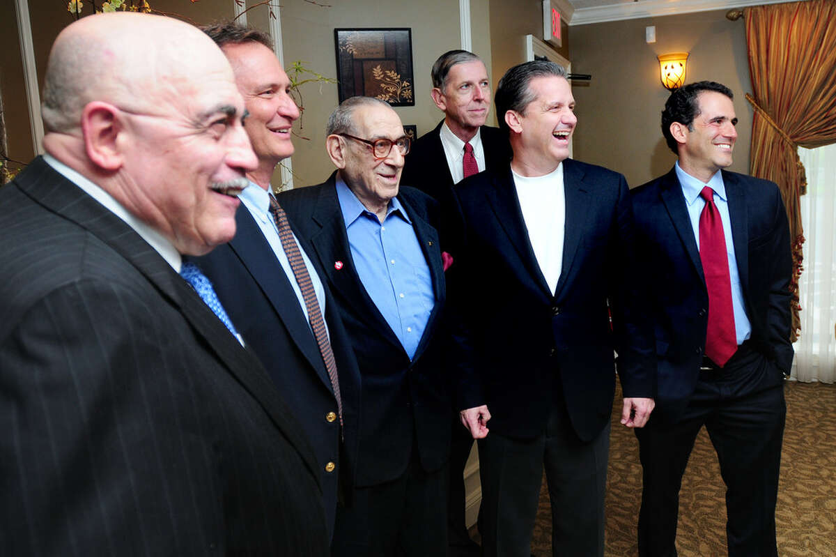 Legendary NYC scout Tom Konchalski (rear, third from right) was in select company during a St. Joseph boys basketball postseason banquet at Vazzano’s Four Seasons on May 9, 2012. From left to right, then-St. Joseph High School boys basketball coach Vito Montelli, then-St. Joseph athletic director Jim Olayos, Five Star Basketball founder Howard Garfinkel, Konchalski, University of Kentucky men’s basketball coach John Calipari and then-Sports Illustrated reporter Seth Davis at Vazzano’s Four Seasons. (Arnold Gold / Hearst Connecticut Media)