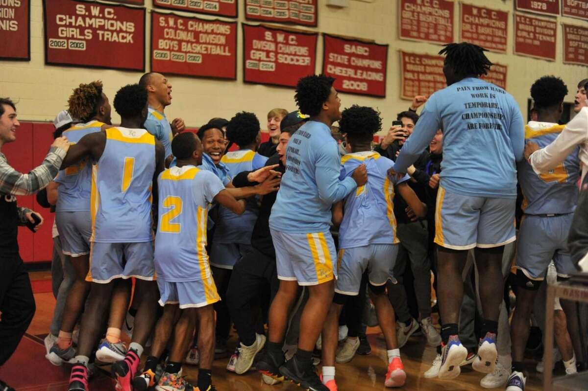 Kolbe Cathedral celebrates its 2020 SWC boys basketball championship, March 5, 2020 at Masuk High School in Monroe (Photo Gregory Vasil / For Hearst Connecticut Media)