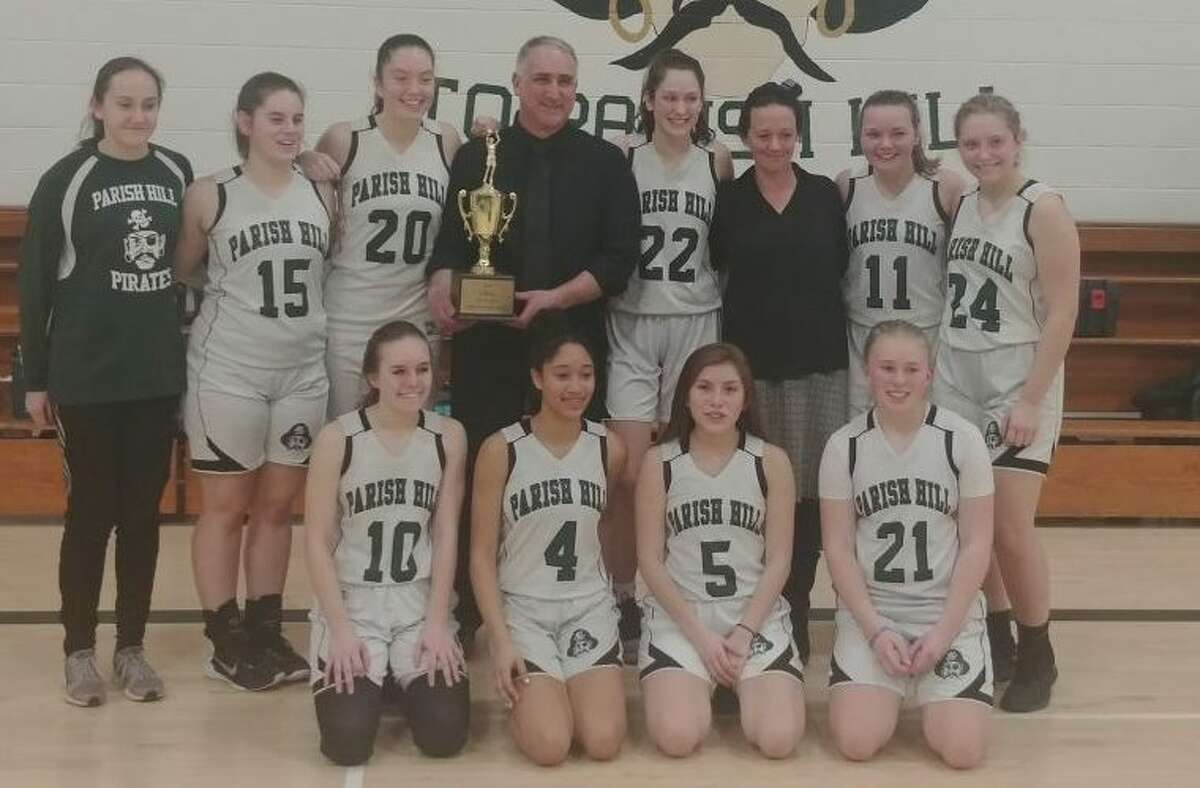 Parish Hill’s girls basketball team after winning last year’s CRAL tournament. The Pirates have yet to lose a league game since joining in 2018. (Photo via Parish Hill)