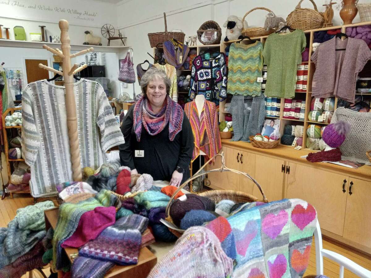 Ginger Balch, owner of In Sheep's Clothing yarn shop on Water Street, Torrington, is holding one of her monthly trunk shows April 23-24, sharing the latest yarn styles and patterns, as well as a display of clothing, with a live audience as well as an online show. She says she has survived and thrived since the pandemic thanks to Facebook Live and a very interactive, busy website.