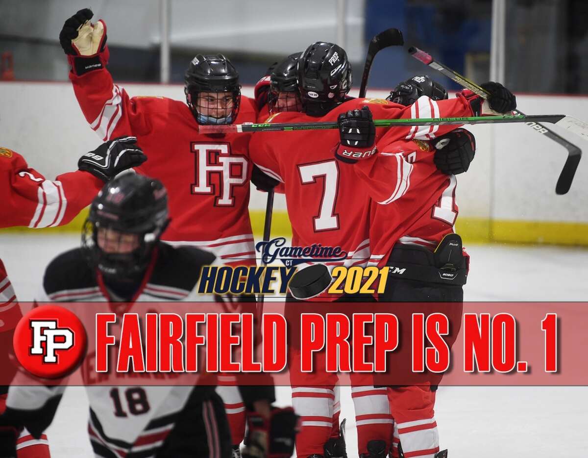Fairfield Prep players celebrate a goal by Aaron Wong in the second period of their game with New Canaan to open the FCIAC ice hockey season at the Darien Ice House in Darien, Conn. on Monday, February 8, 2021.