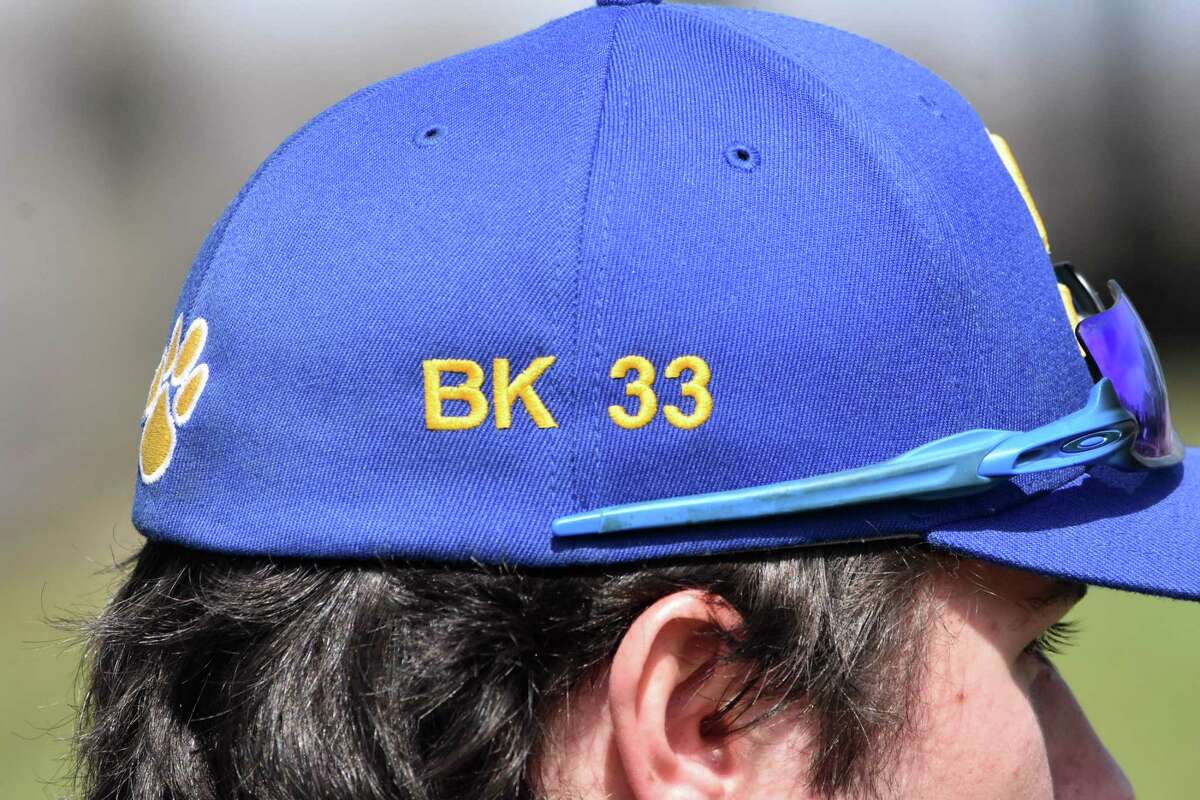 The Seymour baseball team honored former coach Bob Kelo, who died in July, before the team's game against Naugatuck at French Park, Seymour on Saturday, April 10, 2021. (Pete Paguaga/Hearst Connecticut Media)