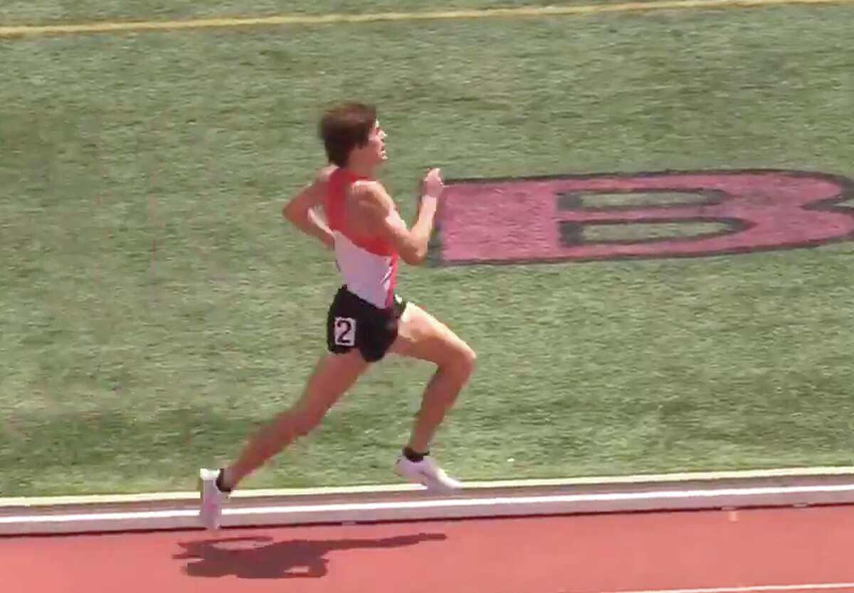 Conard’s Gavin Sherry runs down the stretch to shatter the state’s 1600 record in the 2021 state open at New Britain, Thursday, June 10, 2021.
