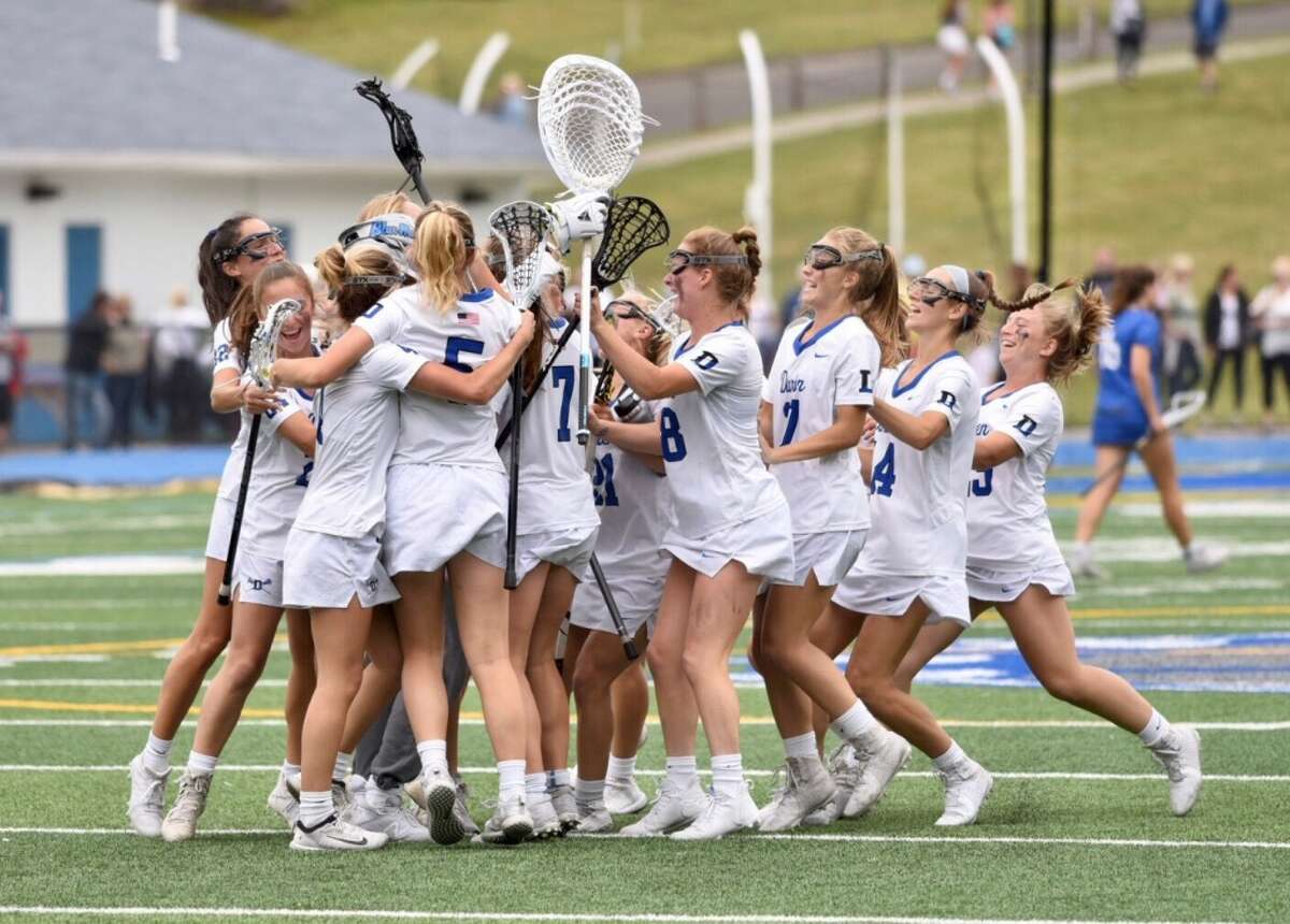Darien celebrates its 14-6 win over Ludlowe in the CIAC Class L girls lacrosse championship on Saturday, June 12, 2021 at Bunnell High School in Stratford, Conn.