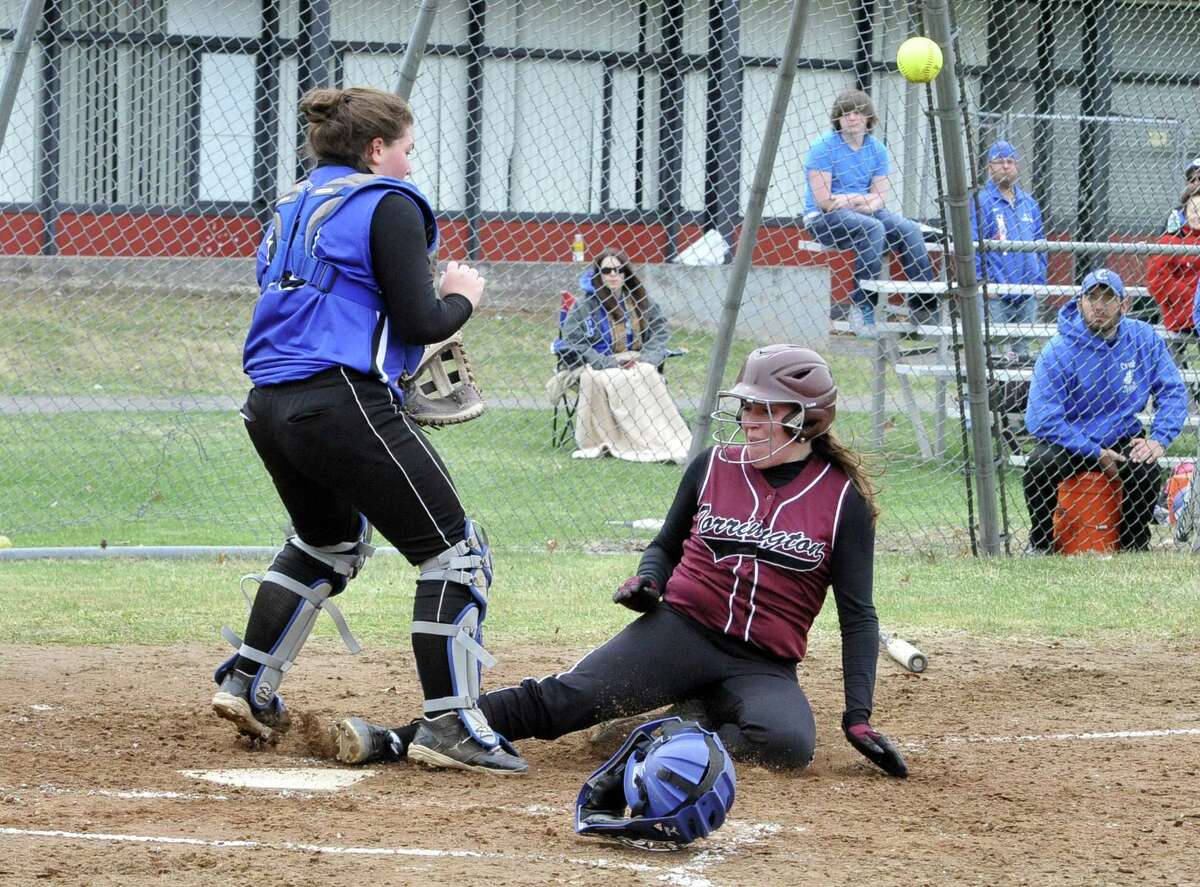 Torrington’s Sara Heath slides in safely after hitting a two-run home run in a recent game. Torrington moved up to No. 2 in the state polls (Photo: Laurie Gaboardi — Register Citizen)