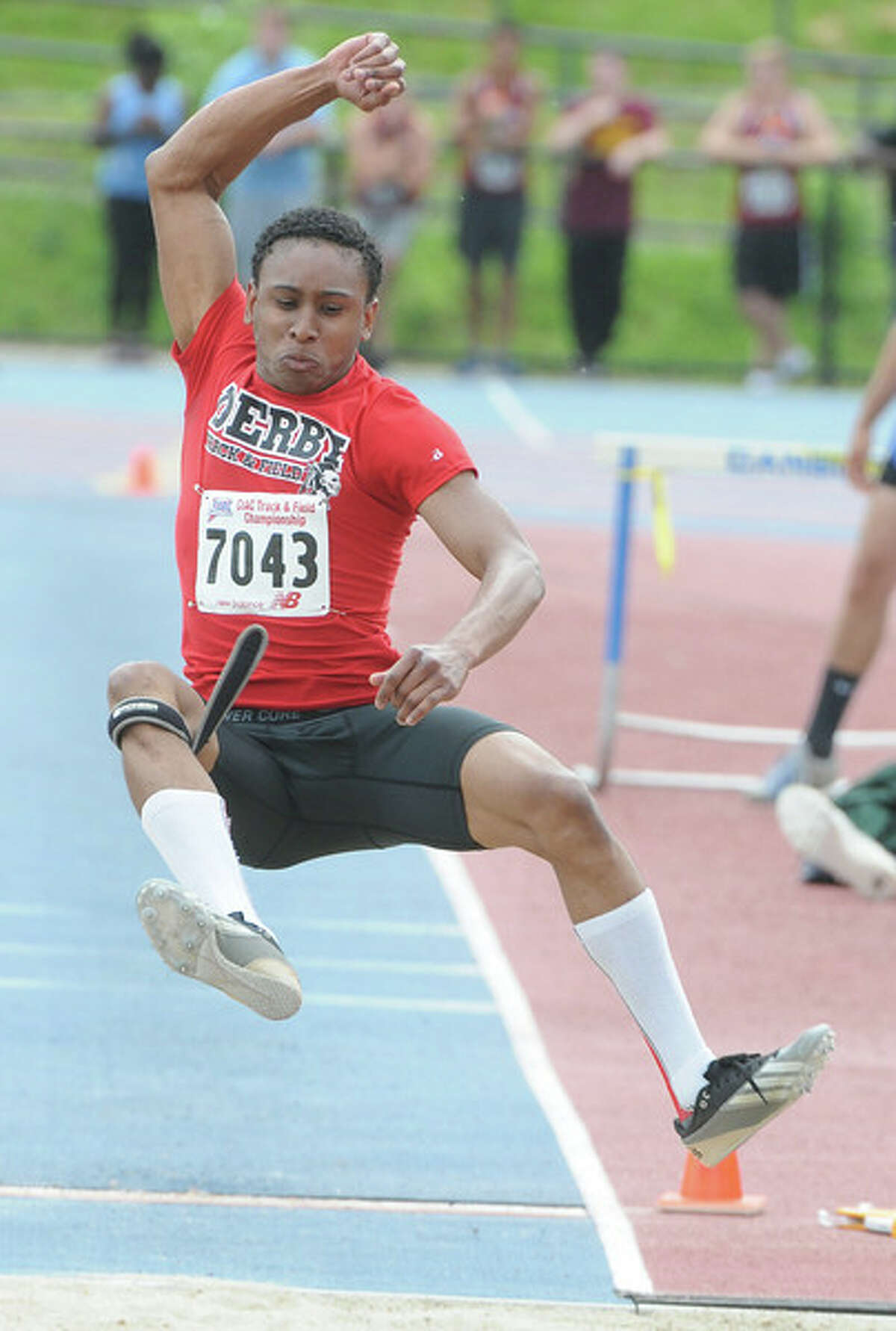 Preston Batson of Derby came in second in the long jump. (Mara Lavitt – New Haven Register)