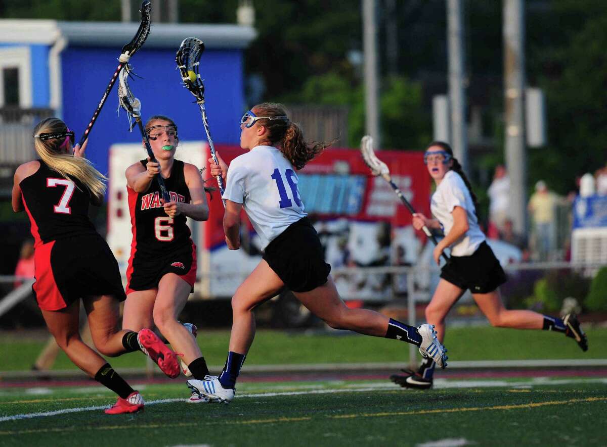 Top-seeded Glastonbury defeated Fairfield Warde 13-5 Tuesday in the Class L state girls’ lacrosse semifinals. Peter Hvizdak – New Haven Register)