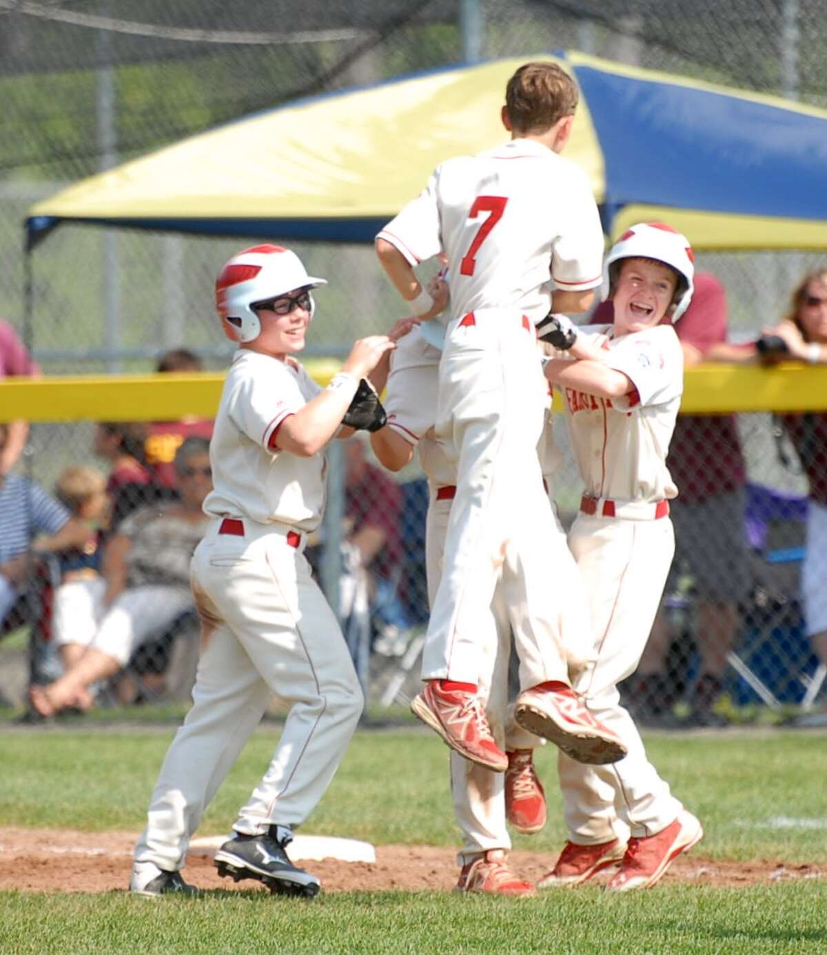 Fairfield American Little League celebrates winning the state title over South Windsor 12-2 on Sunday afternoon in Harwinton. Photo by Mary Albl