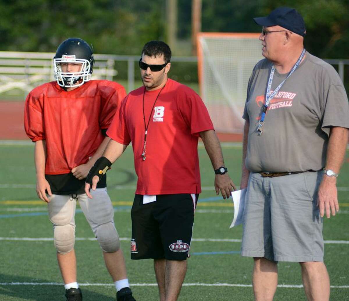 John Limone, center, leads a recent Branford football practice. Dave Phillips/File Photo