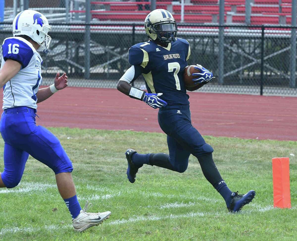 Hyde senior Ronnie Freeman scores one of his six touchdowns against Lewis Mills on Saturday.