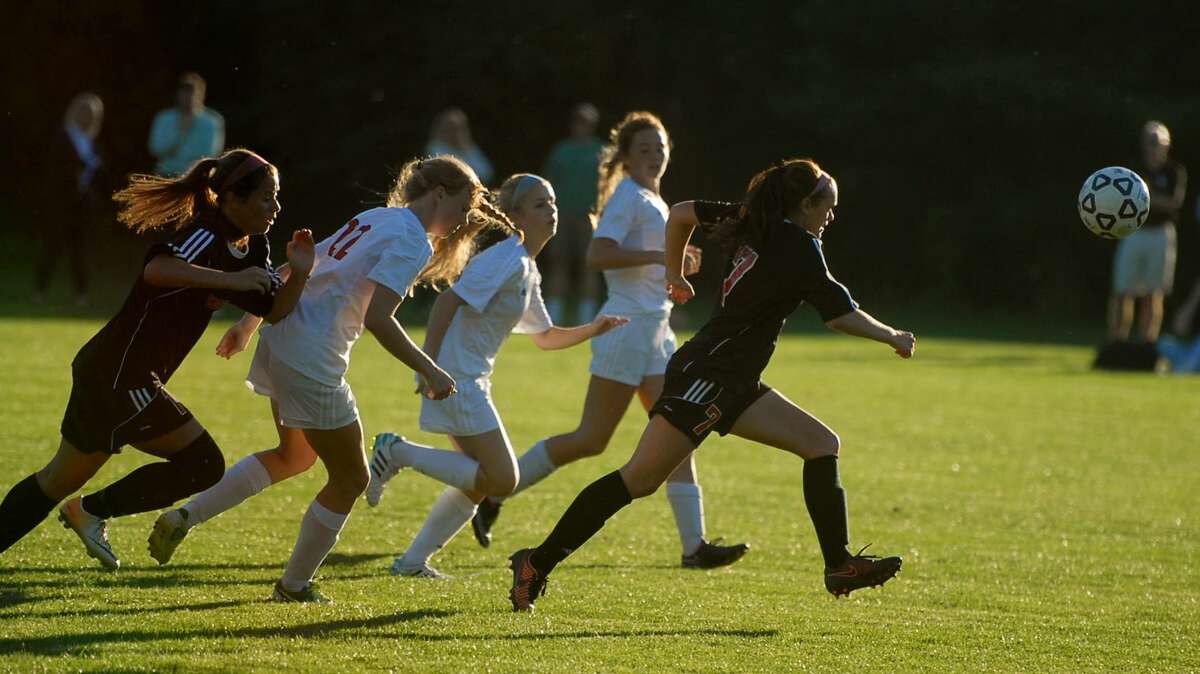 Warde’s Taylor Gabrenas runs down the field before scoring the eventual game-winner for the Mustangs.