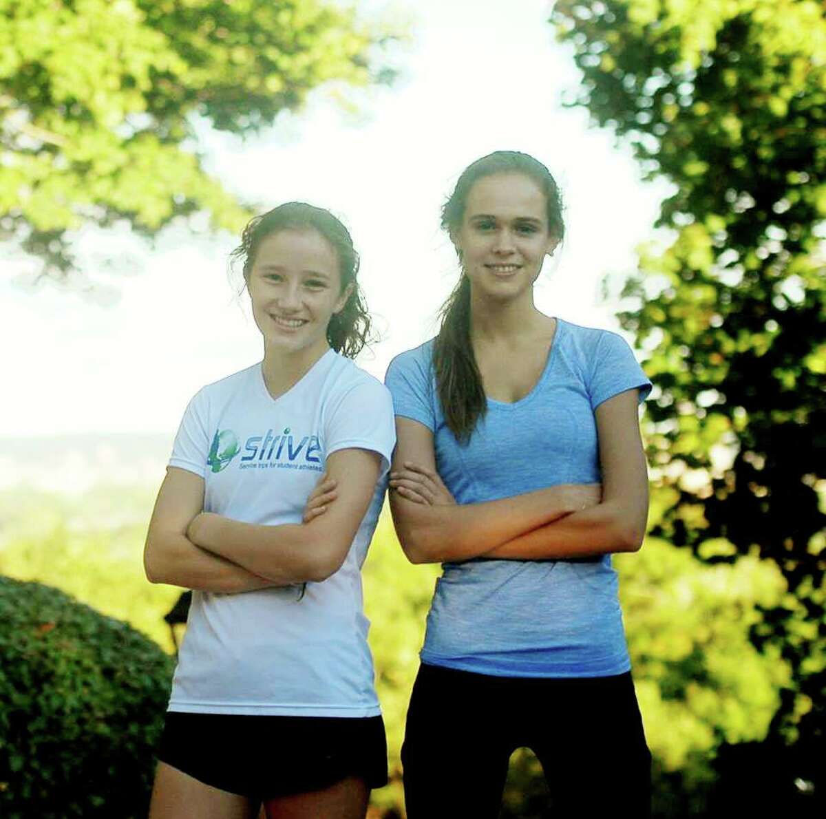 Hannah Springhorn, left, and Isabel Balcezak are the top two runners on the Hopkins’ cross country team. Photo by Mary Albl